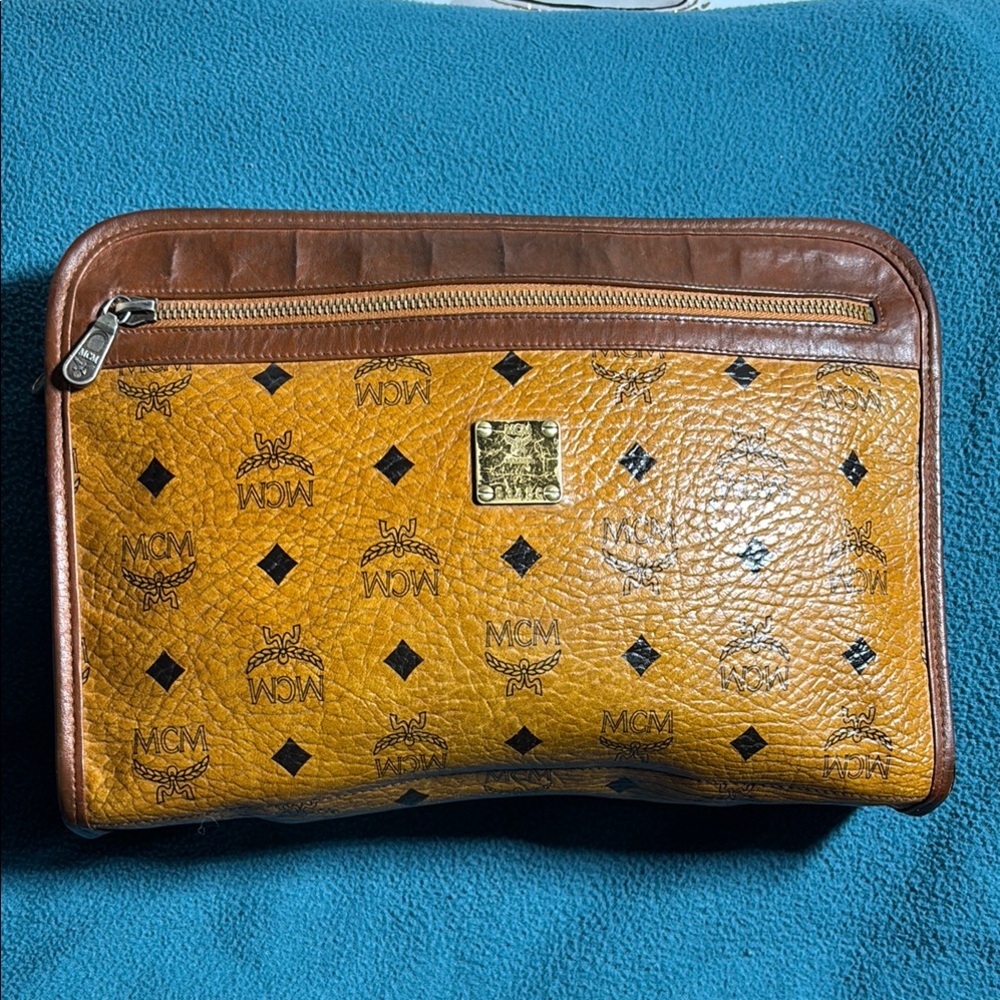 MCM Brown and Gold Toiletry Bag with Iconic Design